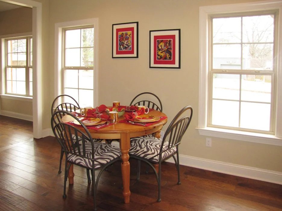 Sunlit breakfast nook with custom millwork