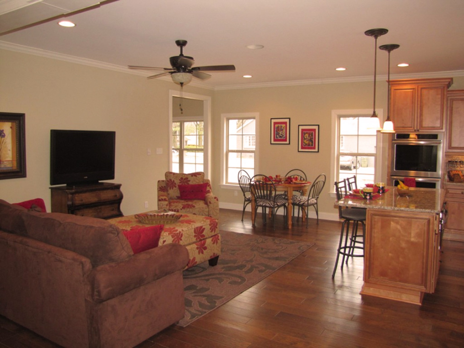 Open kitchen and living area remodeled by Renaissance Homes